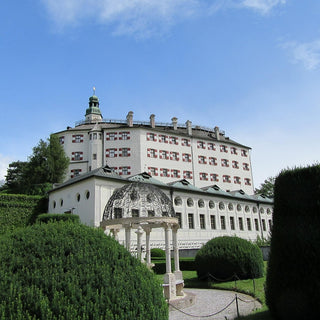 Ambras Castle, Innsbruck, a striking example of Renaissance architecture, characterized by its imposing fortress style