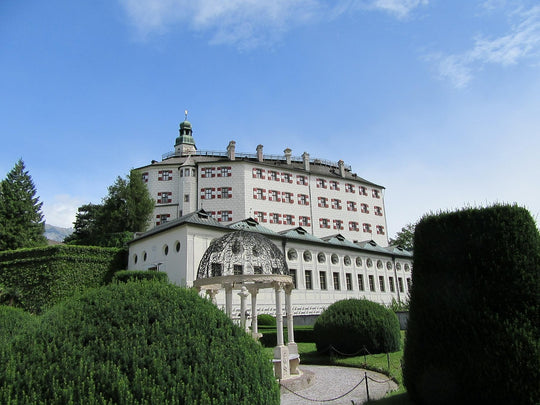 Ambras Castle, Innsbruck, a striking example of Renaissance architecture, characterized by its imposing fortress style