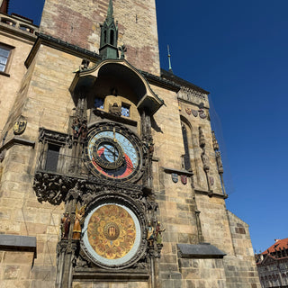 Medieval astronomical clock in Prague's Old Town Square, displaying astronomical information and featuring an hourly show of moving figures