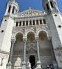 Basilica of Notre-Dame de Fourviere, Lyon, France with two towers against a clear blue sky