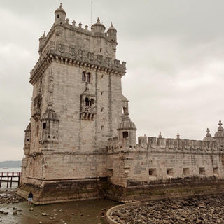 Belém Tower, a 6th-century Manueline-style fortification in Lisbon Portugal, built to defend the city harbour and serve as a gateway for Portuguese explorers