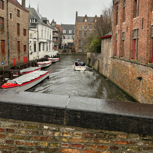 View from a bridge overlooking a canal in Bruges, Belgium
