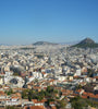 Cityscape view of Athens, Greece with Lycabettus hill in the background