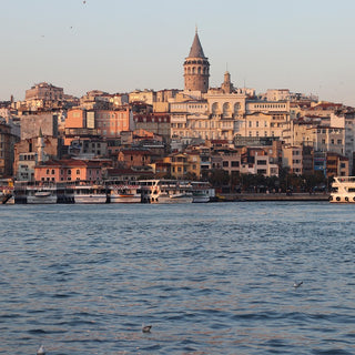 View of the round, stone Galata Tower and district from the Bosphorus Strait