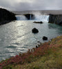 Godafoss waterfall in the shape of a horseshoe, creating a beautiful curtain of water. Iceland