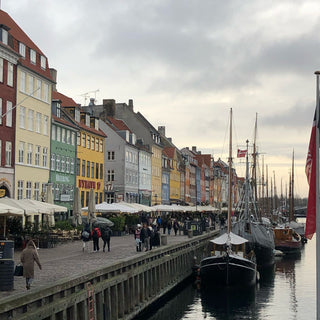 Many coloured traditional buildings along the harbour side in Copenhagen Denmark