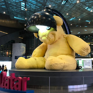 23-foot canary yellow teddy bear sculpted from bronze, Doha airport