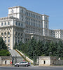The massive white facade of the People's Palace Bucharest, Romania