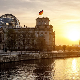 Reichstag building and Bundestag district in Berlin - Germany during sunset