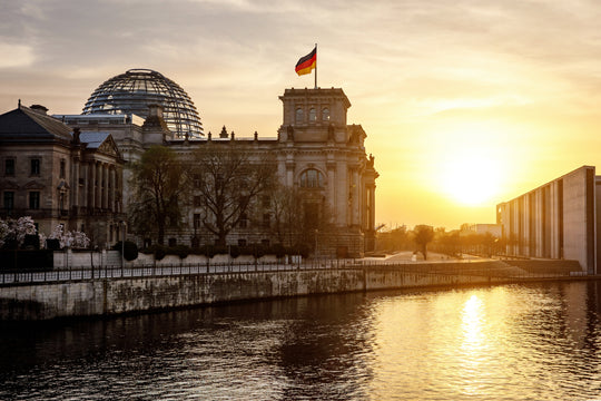 Reichstag building and Bundestag district in Berlin - Germany during sunset