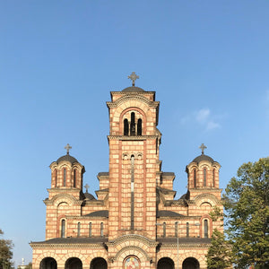 St. Mark's Church in Belgrade, Serbia. Build from pale stone with contrasting red bricks and green domes