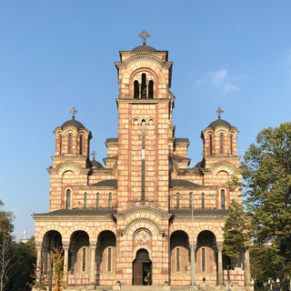 St. Mark's Church in Belgrade, Serbia. Build from pale stone with contrasting red bricks and green domes