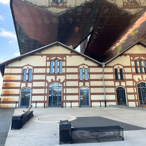 Art Museum with original building reflected in the modern glass extension, Krakow, Poland