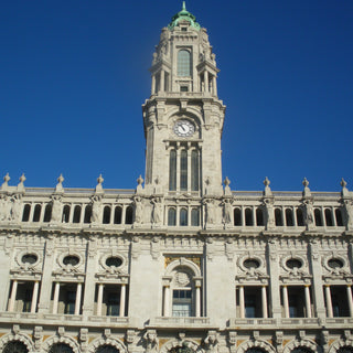 The Porto City Hall, in Portugal, features a monumental clock tower accessible by 180 steps, with its interior richly decorated in marble and granite