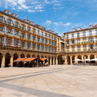 View of the Plaza de la Constitucion (Constitution Square) in heart of San Sebastian Old Town, Spain. Rectangular shape and surrounded by 4-storey arcaded buildings